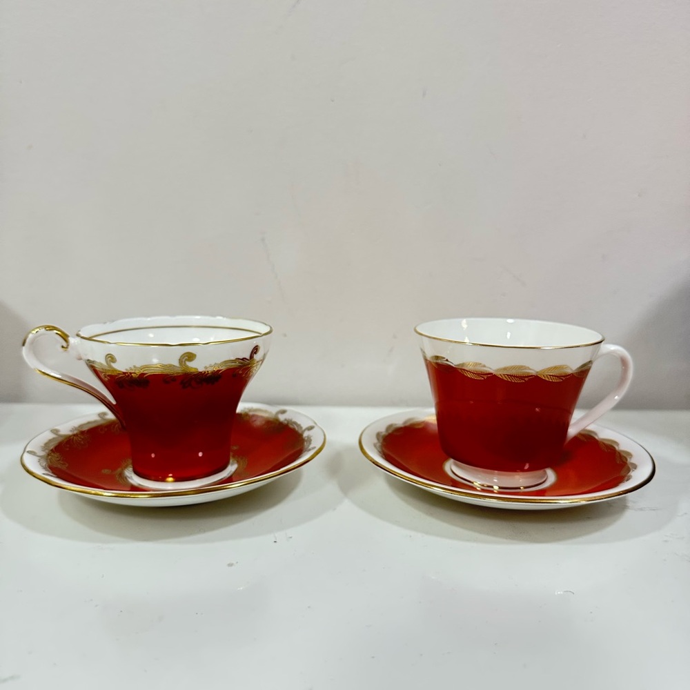 pair of vintage Aynsley Corset Shaped Teacups and Saucers.